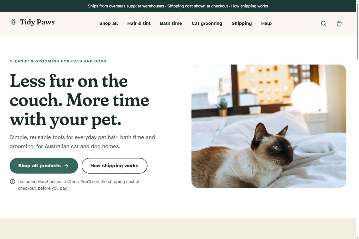 Tidy Paws homepage with its green navigation, pet-care headline and cat photograph.